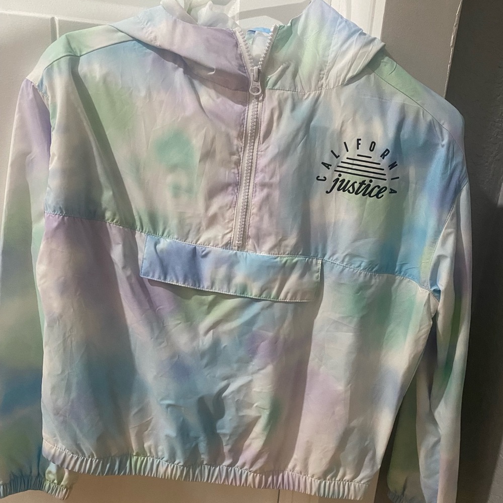 Size 12 (kids) Justice windbreaker.  Worn only once